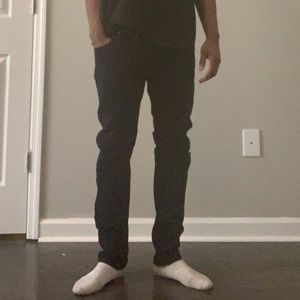 Navy blue jeans with rips, never worn